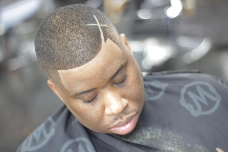 Buzz cut with custom hair design by Mac, Nashville barber