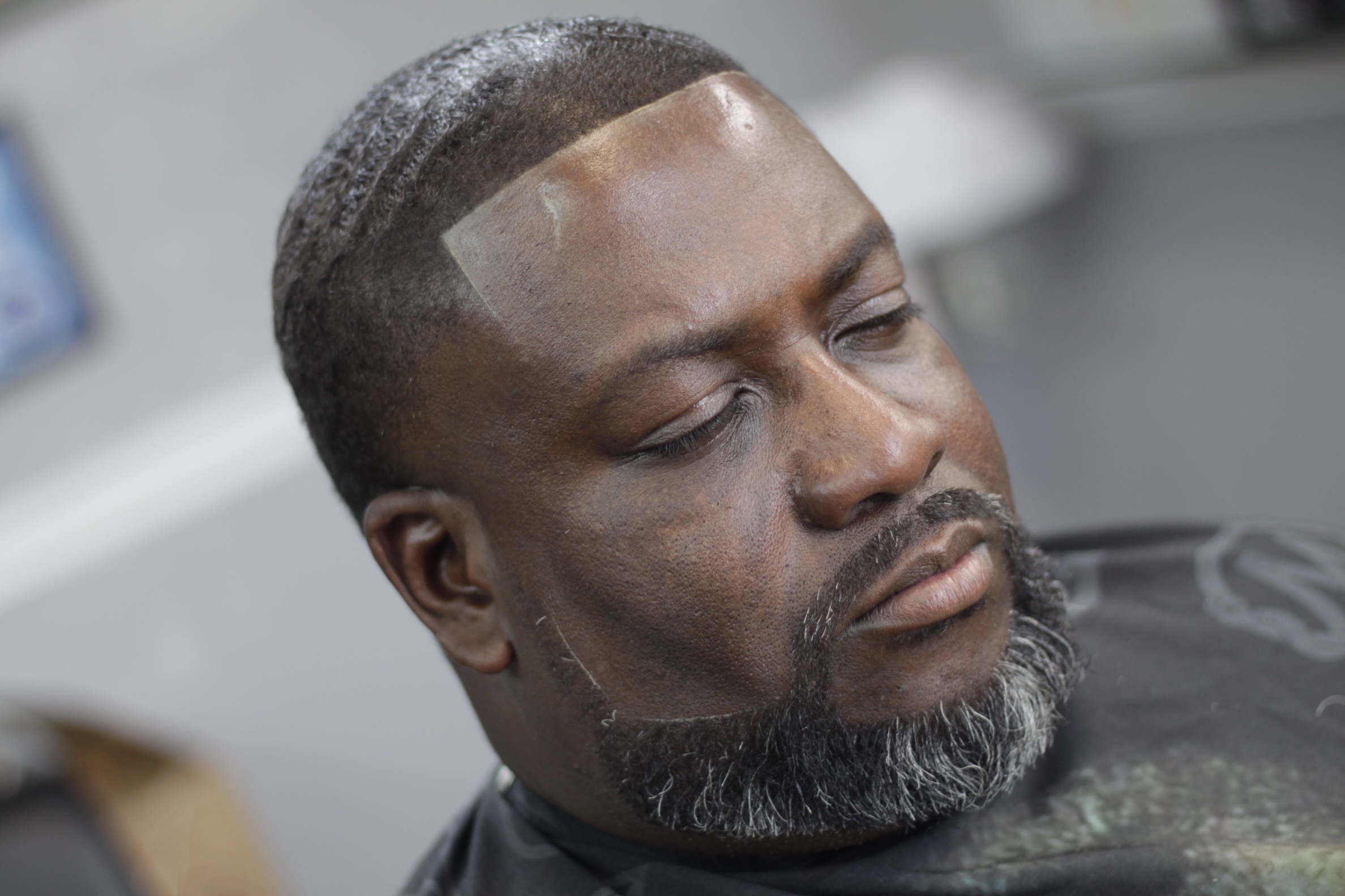 Wave cut with sharp lineup by Mac — Nashville barber