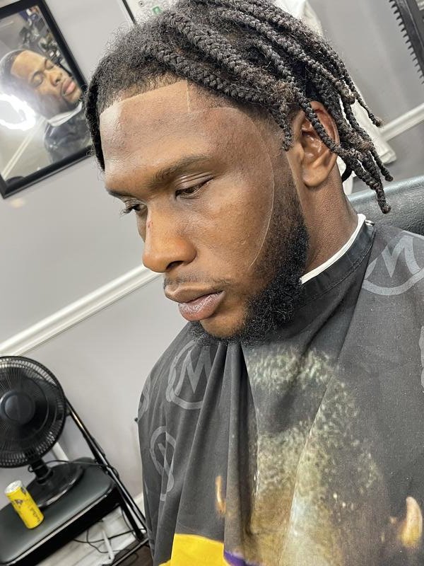 Locs with taper fade by Mac, Nashville barber