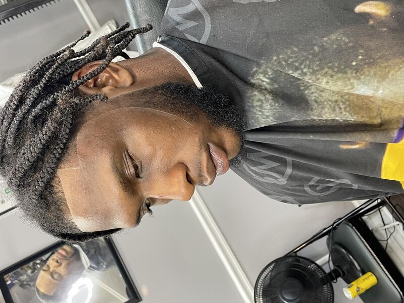 Locs with taper fade by Mac, Nashville barber
